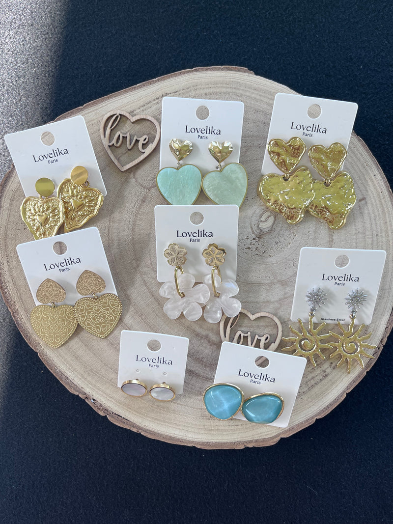 Collection bijoux femme - colliers, bracelets et boucles d'oreilles en acier inoxydable et argent
