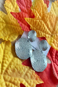 Boucles d’oreilles argentées rondes pendantes pour femme au design épuré, mode femme 2026 -Le style by laëti