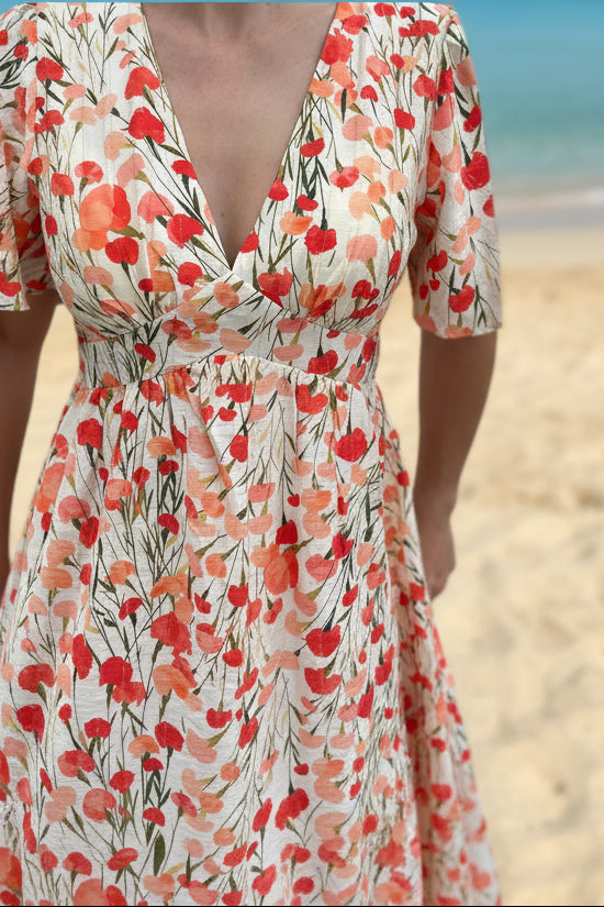 → "Robe Courte Imprimée Florale – Silhouette complète, imprimé floral orange exclusif, idéale pour l'été vetelment feeme la baule pornichet guerande