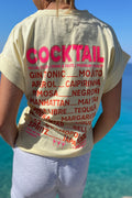 T-shirt jaune femme – vue dos avec imprimé COCKTAIL rose fluo, liste de cocktails Gin Tonic, Mojito, Aperol, Spritz, fabrication italienne